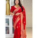 PURE Silk Saree With Its Rich Pallu And Intricate Brocade Blouse