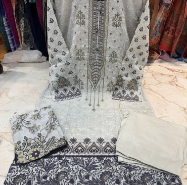 Full stitched cotton top with self embroidery & latkans